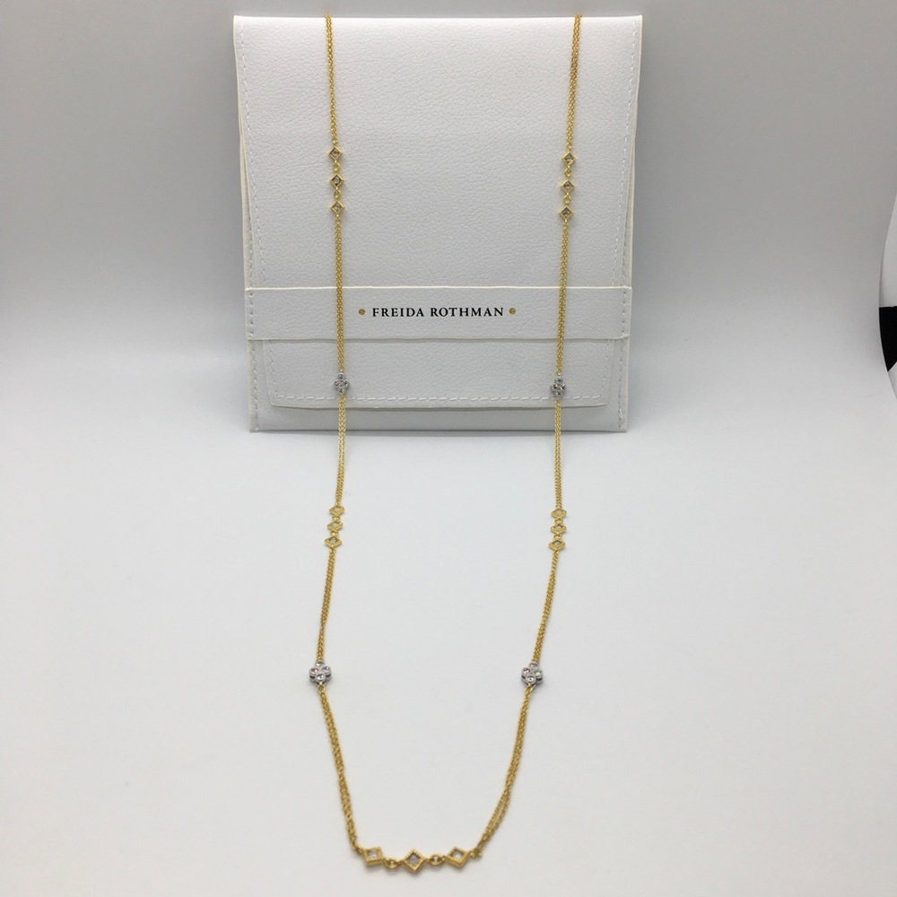 Freida Rothman long strand gold necklace